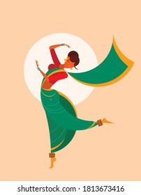 Indian, Maharashtrian folk dancer in a celebration dance pose of Lavani dance.