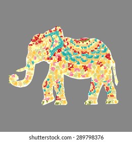 Indian multicolored silhouette elephant in profile on grey background. eps 10. vector