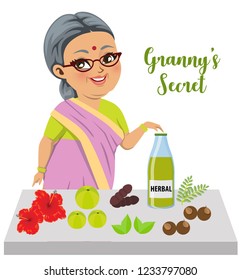 An Indian old lady wearing a saree has made an ayurvedic hebal potion for hair care using secret ingredients like - Amla (gooseberry), reetha (soap nuts), henna (Mehendi), Jaswandi (shoeflower)