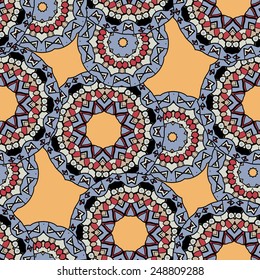 Indian ornament, kaleidoscopic flora pattern. African abstract seamless pattern. Vintage motif.