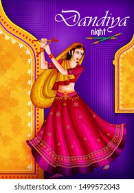 Indian people dancing Garba on Dandiya Night celebrating Navratri festival of India