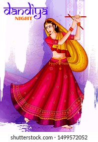 Indian people dancing Garba on Dandiya Night celebrating Navratri festival of India