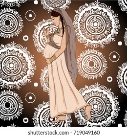 indian pregnant woman in pregnancy dress is prepared for maternity