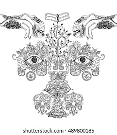 indian psychedelic mask,face  of the lord shiva.with two hands
