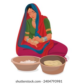 Indian Rajasthani woman cooking food roti bread