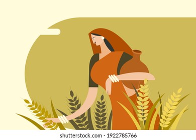 Indian rural woman carrying water pot standing in a wheat field