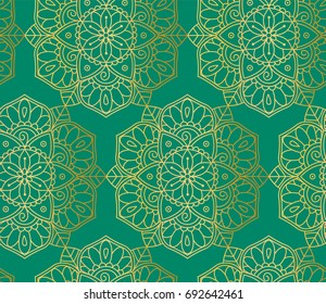 Indian seamless pattern consisting of gilding mandalas. Green background. Vector illustration.