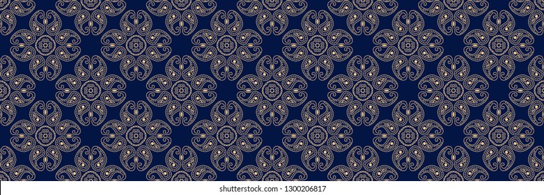 Indian seamless pattern. Golden design on long dark blue background