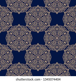 Indian seamless pattern. Golden design on dark blue background