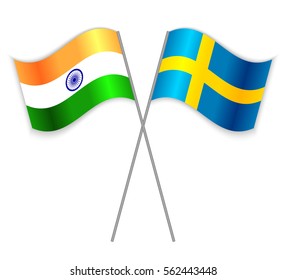 Indian and Swedish crossed flags. India combined with Sweden isolated on white. Language learning, international business or travel concept.