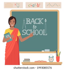 Indian Teacher Stands Near The School Blackboard Vector Illustration In Flat Style.