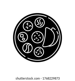 Indian thali black glyph icon. Traditional cuisine. Asian culture. Food habits of India. Chapati bread with sauces. Flatbreads on plate. Silhouette symbol on white space. Vector isolated illustration