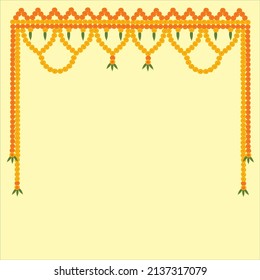 Indian Toran arch in loop with yellow and red marigold flowers, green mango leaves on light yellow background