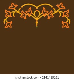 Indian Toran decoration with red and yellow marigold flowers  on dark brown color background.