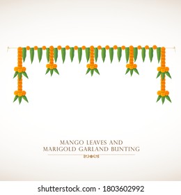 Indian traditional bunting Torana for festival decoration. Eco friendly bunting torana with marigold flower and mango leaf. Traditional decorative element for indian festival.