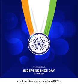 Indian tri color made Medal on glowing blue bookeh background. Indian Independence Day