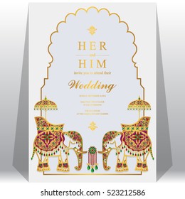 Tarjeta de boda india, color dorado y cristales con motivos de elefante.