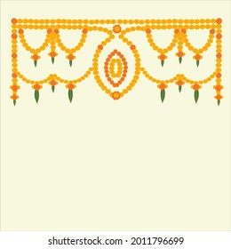 Indian welcome hanging floral decoration with marigold flowers in yellow and orange color on off white background.