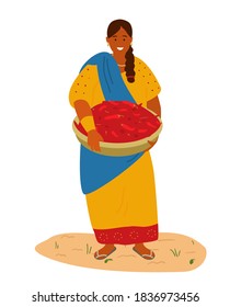 Mujer India En Colorido Vestido Tradicional Con Cesta Con Pimienta Chili. Concepto de cosecha. Ilustración de vectores planos.