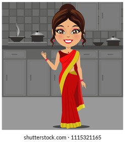 Indian woman in kitchen making food wearing a traditional saree outfit