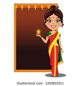 An Indian woman from the state of Maharashtra is holding a diya (lamp) in her hand and wearing a nauvari (Nine yard) saree and celebrating diwali. There is a decorated door at her back.