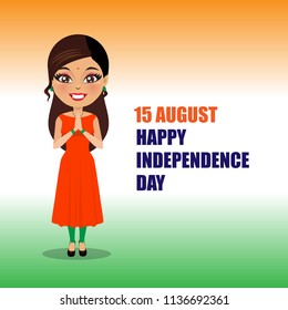 An Indian woman wearing a salwar kameez is in a namaste pose and is wishing everyone a happy independence say of India. She is standing in front of a flag colored background.