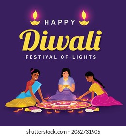 Indian women in tradional clothes making flowers and diya lamps Rangoli on Diwali Festival