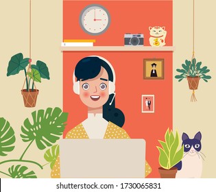 Indian young business woman working in front of a computer while sitting at home. Home office, remote work, freelance, peaceful atmosphere with a laptop.