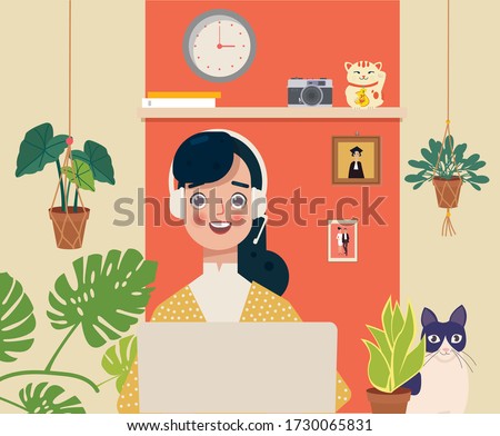 Indian young business woman working in front of a computer while sitting at home. Home office, remote work, freelance, peaceful atmosphere with a laptop.
