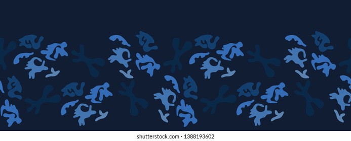 Indigo blue abstract organic cut out shapes. Vector border pattern seamless background. Hand paper cutting matisse style. Collage graphic edging illustration. Trendy home decor, tossed ribbon trim.