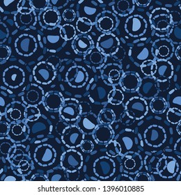 Indigo blue abstract organic dotty ring circles. Vector pattern seamless background. Hand drawn textured style. Polka dots tossed illustration. Trendy home decor,men shirting fashion print, wallpaper.