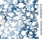 Indigo blue flower print dyed linen texture background. Seamless woven repeat batik pattern swatch. Floral organic distressed block print all over textile. 