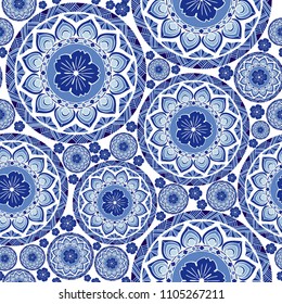 indigo blue Porcelain chic boho mandala design from flower and betel leaf vector seamless pattern with white and blue tone background
  