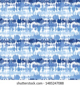 Indigo blue shibori tie dye horizontal stripe. Seamless pattern background. Japanese style batik textile. Variegated for summer fashion swatch.