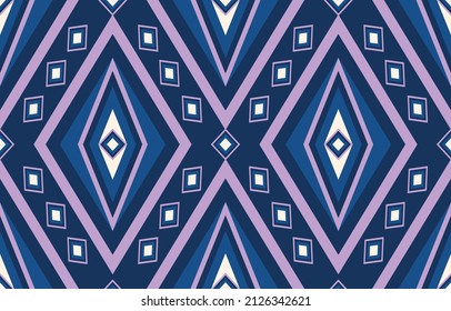 Indigo Diamonds Traditional ikat fabric pattern. Seamless geometric. Purple White and Blue Color. Using in the fashion industry.
