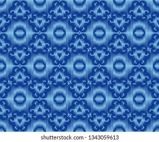 Indigo dyed ikat seamless pattern. Original patterned fabric texture.