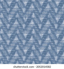 Indigo ikat chevron Effect Textured Chevron Background. Seamless Pattern.art striped, dip dye zig zag Seamless ethnic pattern of indigo color on white silk. Ikat seamless pattern. 