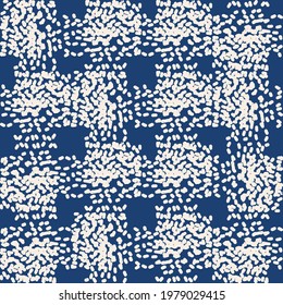 Indigo tie dye shibori vector seamless pattern. Minimalist geometric oriental  tile repeat in navy blue and off white. Organic texture. Japanese traditional print.
