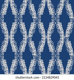 Indigo tie dye shibori vector seamless pattern. Minimalist geometric oriental  tile repeat in navy blue and off white. Organic texture. Japanese traditional print.
