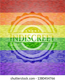 Indiscreet on mosaic background with the colors of the LGBT flag