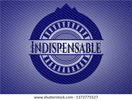 Indispensable badge with denim background