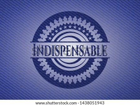 Indispensable badge with denim texture. Vector Illustration. Detailed.
