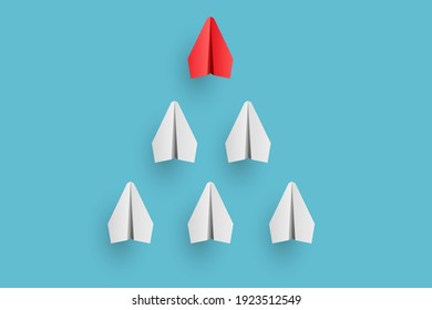 Individual red leader paper plane lead other. Business and leadership concept