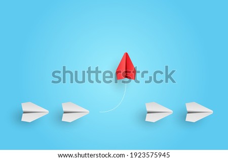 Individual red leader paper plane lead other. Business and leadership concept