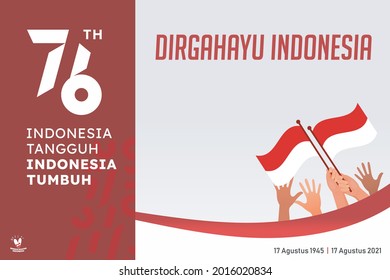 indonesia independece day greeting card concept with lettering dirgahayu 17 agustus and hads up holding flags