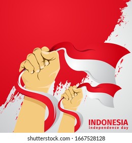 indonesia independence day with hand holding flag