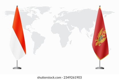 Indonesia and Montenegro flags for official meeting against background of world map.