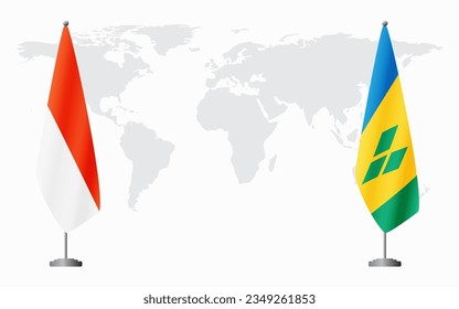 Indonesia and Saint Vincent and the Grenadines flags for official meeting against background of world map.