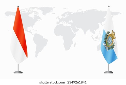 Indonesia and San Marino flags for official meeting against background of world map.