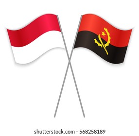 Indonesian and Angolan crossed flags. Indonesia combined with Angola isolated on white. Language learning, international business or travel concept.